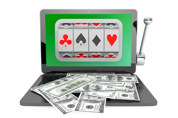 Slot machine inside laptop with dollars