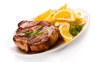 Grilled steak and lemon