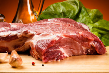 Fototapeta premium Fresh raw pork on cutting board