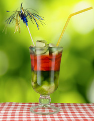 image of cocktail on green background