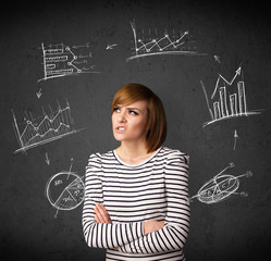 Young woman thinking with charts circulation around her head