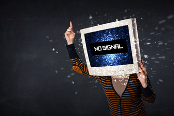 Girl with a monitor head and no signal on the display screen