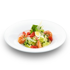 Fresh delicious italian caesar salad with royal shrimps. Isolate