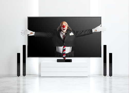 Clown reaching from 3D TV screen