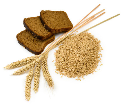 Isolated image of bread and wheat on white background