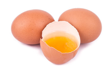 eggs on a white background with an open egg
