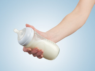 Powdered milk in bottle, dairy food for baby