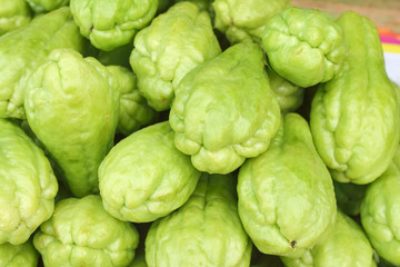 Fototapeta premium Pile chayote fresh vegetables on the market