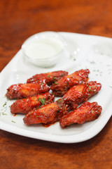 Chicken wings with sauce