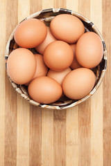 Chicken eggs in a traditional ceramic bowl