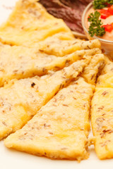 slices of polenta with sauce