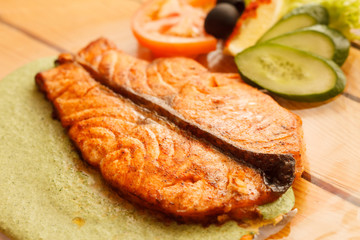 salmon steak with vegetables