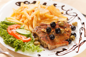 grilled steak with french fries