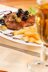 grilled steak with french fries