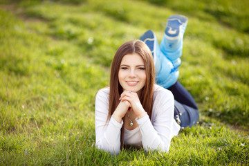 Happy teenager girl at green spring nature