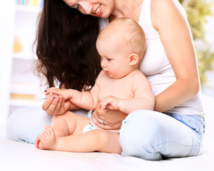 Portrait of angelic baby and his mother