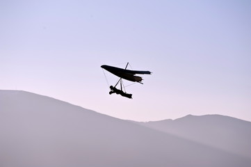 Fototapeta na wymiar paragliding glider in the sky