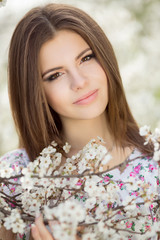 Beautiful teenager girl at green spring nature