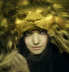 Fotobehang Beautiful young woman with lion mask © vali_111