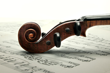 Peg box and scroll of violin. Close up. Vintage Style.