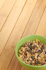 Delicious and healthy cereal in bowl with milk