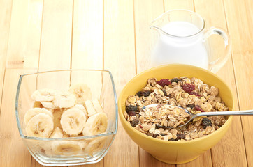 Delicious and healthy cereal in bowl with milk