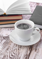 Cup of coffee on a wooden table