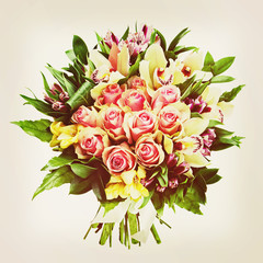Bouquet of roses, lilies and orchids with retro filter effect.