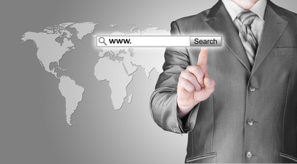 Businessman pushing virtual search bar