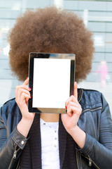 Young woman with afro hair cut and empty tablet