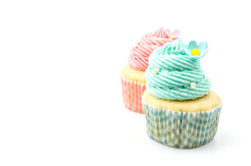 Vanilla cupcakes isolated white background