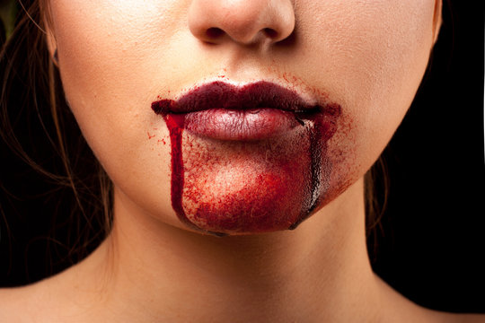 Closeup of Red lips of a young girl