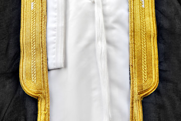 A bisht is a traditional Arabic men's piece of clothes
