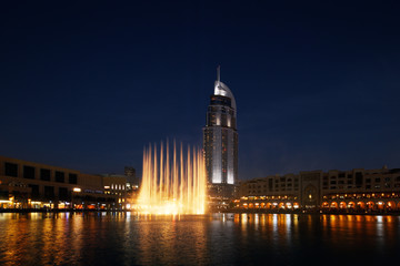 Fototapeta premium The Dubai Fountain performs and dances to the beat of the music