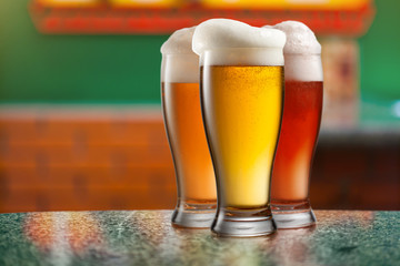 Different beer in glasses in pub