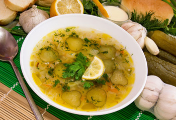 Rassolnik soup with salted cucumber.