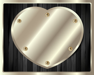 Wooden background with a heart of silver