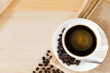 Coffee cup and coffee beans background