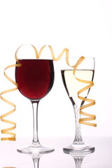 Full glasses of champagne and wine isolated on white