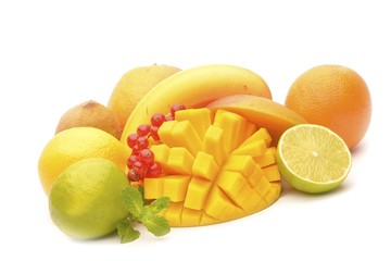 Slice of mango, lime and other fruits on white background
