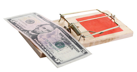 Mousetrap with dollar isolated on white