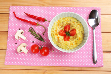 Bowl of tasty fresh hummus, close up