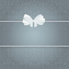 Wedding card for invitation with bow and panel for text.