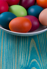 Easter eggs in the blue  wooden background
