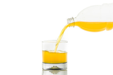 pouring orange juice splash on a white background