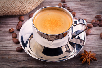 cup of Coffee on wooden vintage table