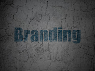 Advertising concept: Branding on grunge wall background