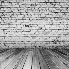 Bricks in black and white room