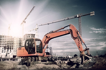 excavator on construction site - 63254520