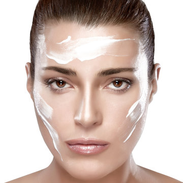 Beautiful Spa Girl with Cream on Her Face. Skincare concept